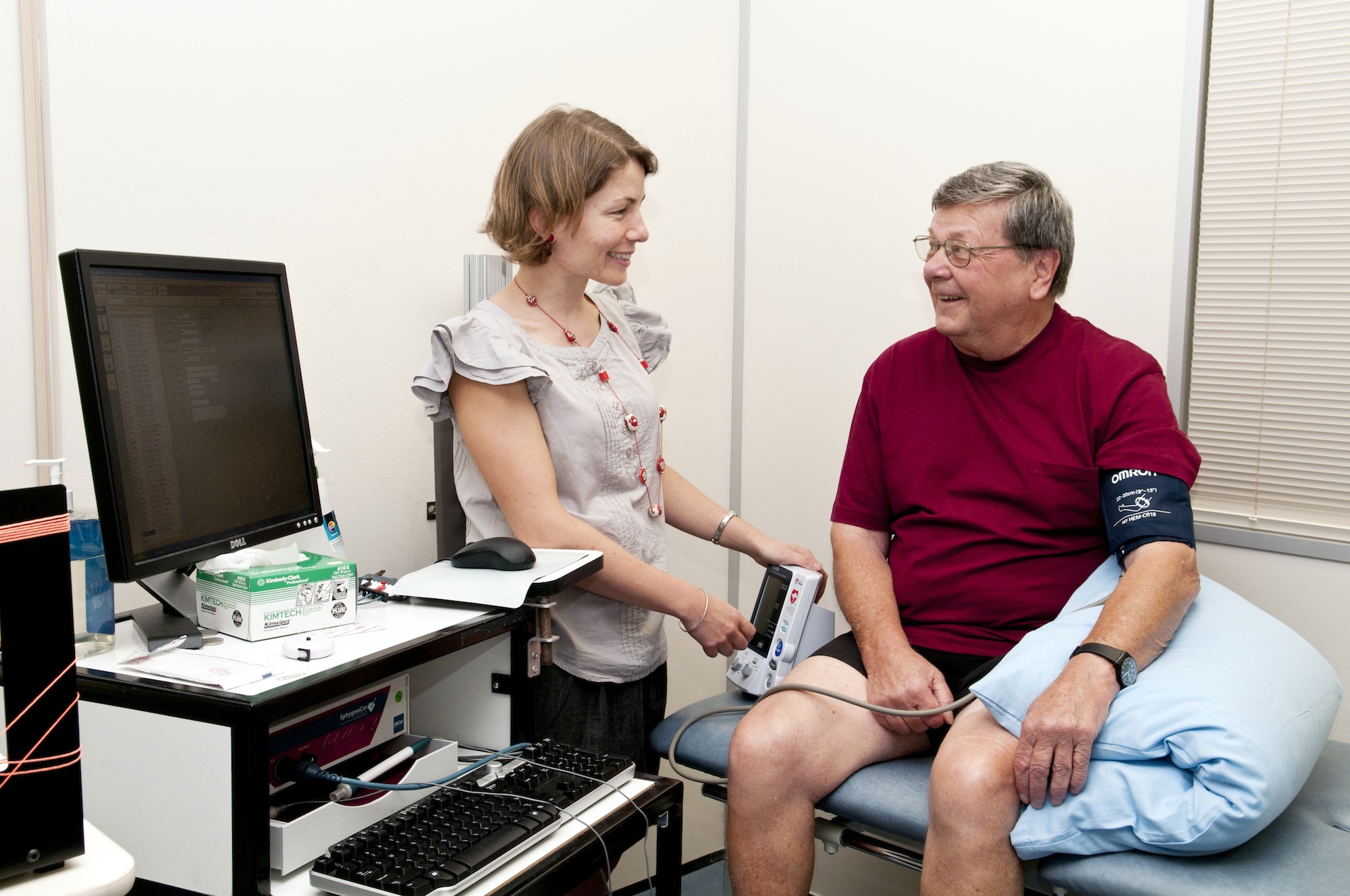 Dr Jasmine Menant measures a patient's blood pressure